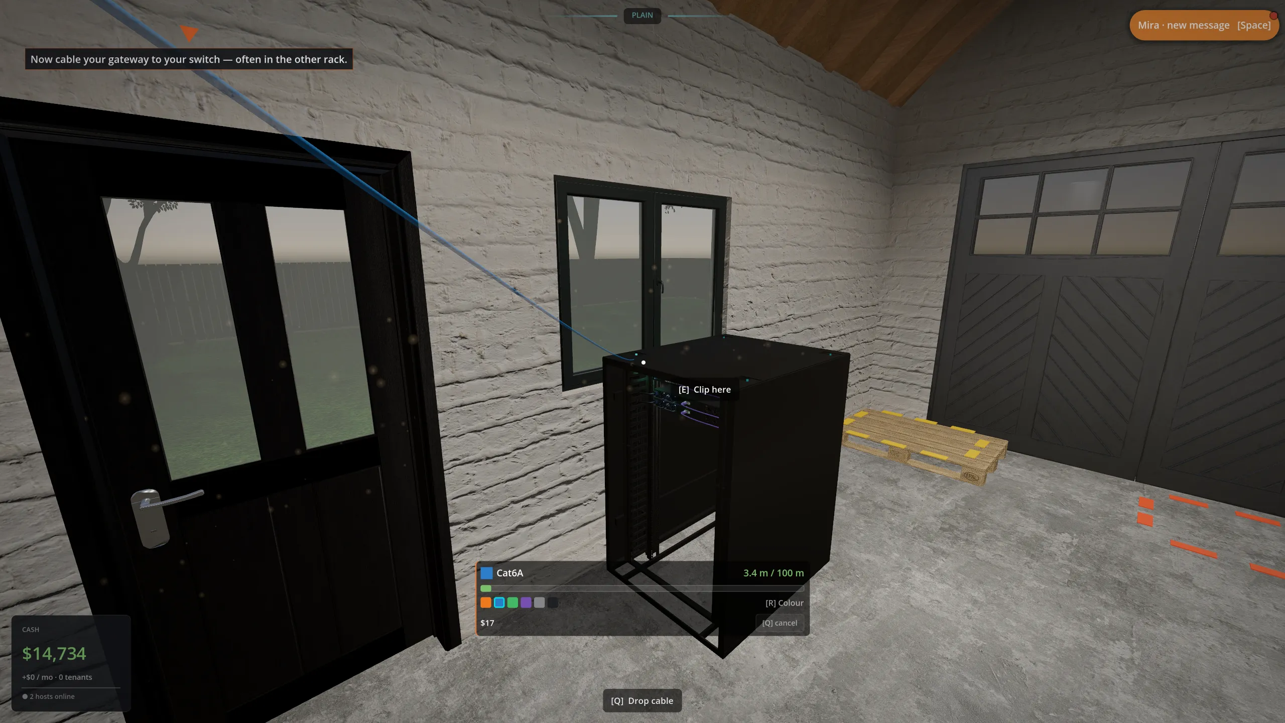 Spooling a cable from the wall rack across to the floor rack: the switch-to-router run